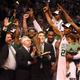 Boston Celtics owner Wyc Grousbeck (holding trophy) celebrates after team defeats the Los Angeles Lakers in Game 6 of the 2008 NBA Finals on June 17, 2008, at TD Banknorth Garden in Boston. (Elsa/Getty Images)